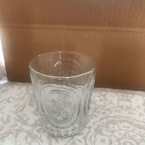 Small juice glasses or votive candle holders